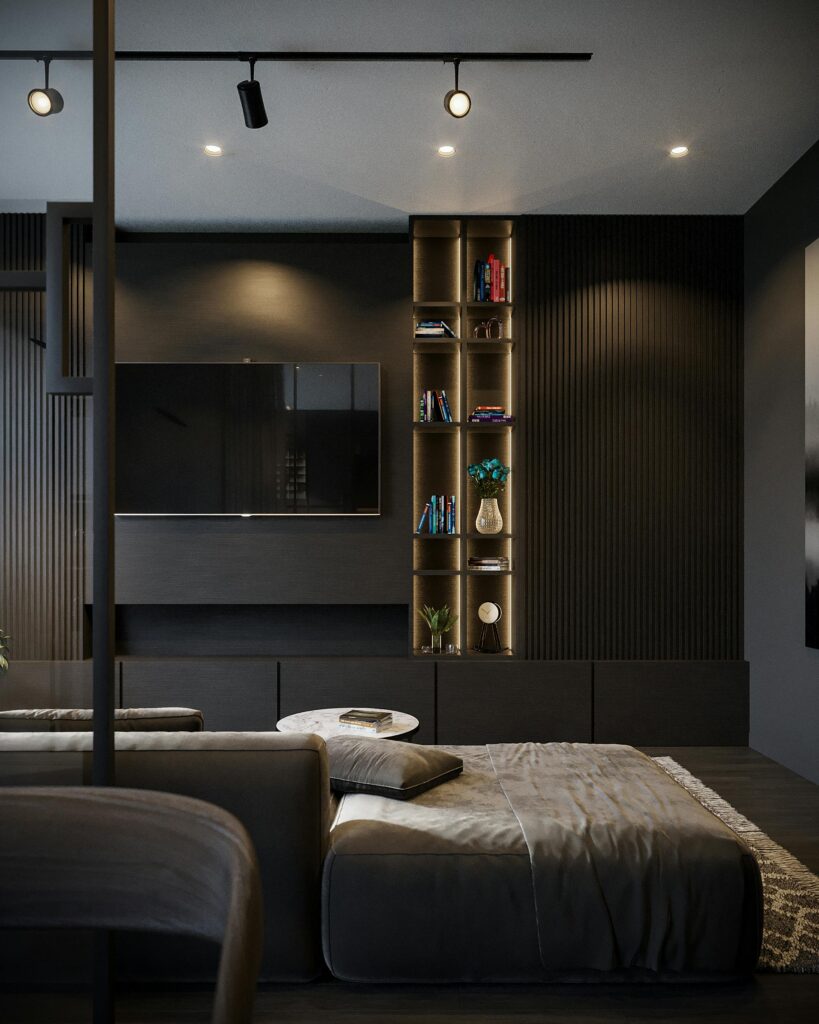 Sleek modern living room featuring dark tones, wall TV, and elegant furniture.