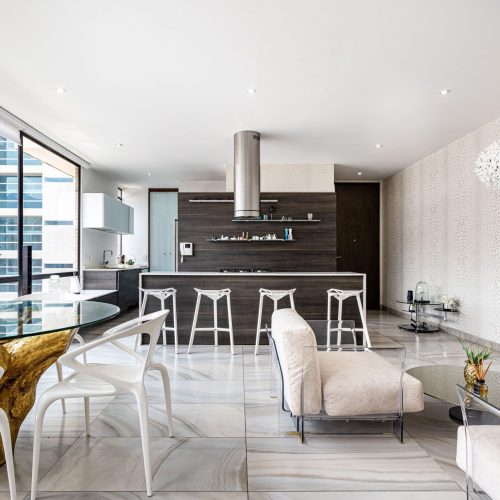 Elegant modern apartment with open kitchen and stylish decor, Comprare casa.